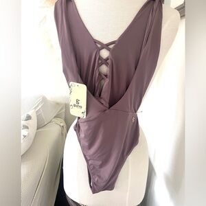Guria one piece swimsuit in muted purple with strappy lace up front size small